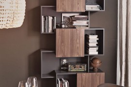 Trendy modern bookshelf unit by Andrea Lucatello with sliding doors