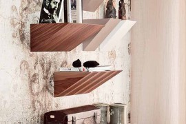 Unique floating bookcases bring eclectic beauty to this living room