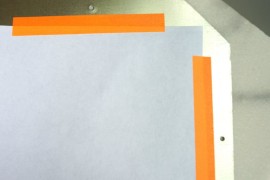 Use washi tape to secure the photo to the back of the frame