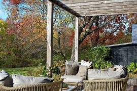 Wooden beams offer shade and give the deck space a sense of uniqueness