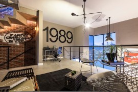 An array of industrial design elements come together in this beautiful living room [Design: CityLoft]