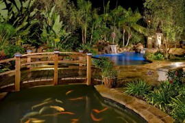 Arched Japanese-style bridges look great even in contemporary backyards