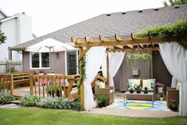 Backyard patio lounge with a pergola