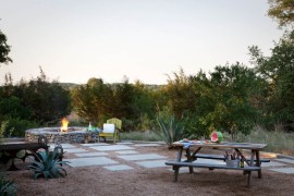 Backyard with a graveled dining area