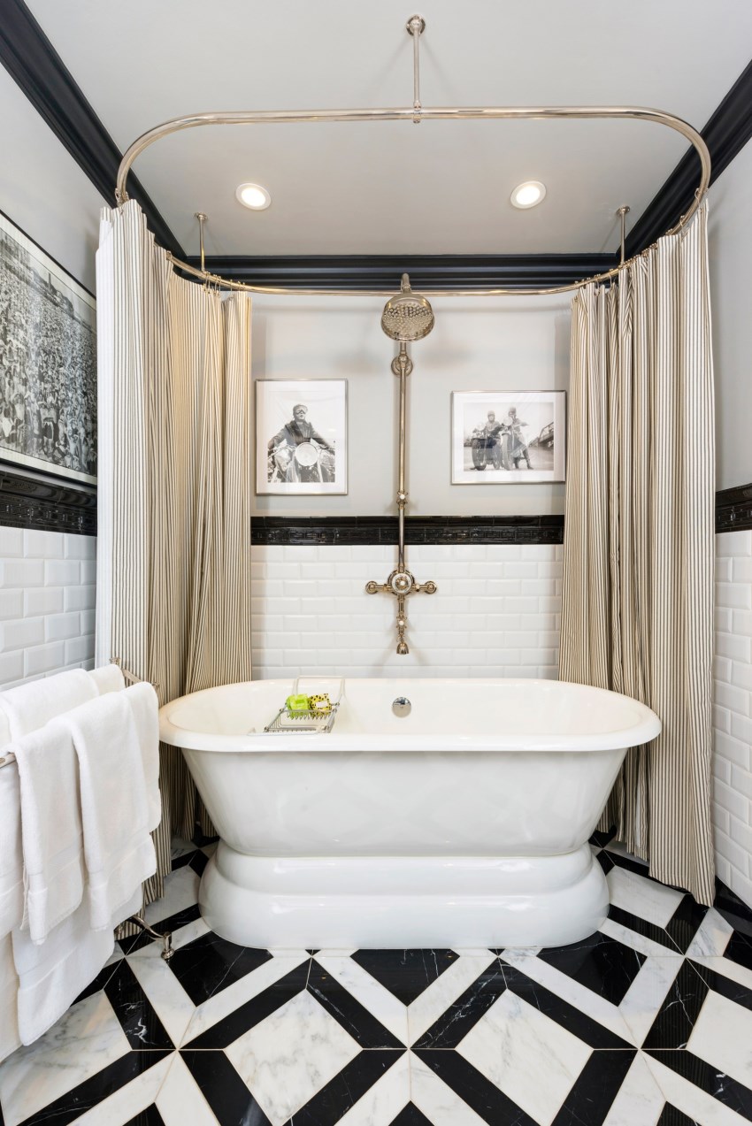 Bathroom with black trim and a tile floor - Decoist