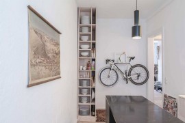 Bicycle mounted on the wall immediately draws your attention