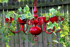 Old chandelier transformed into a gorgeous planter in red