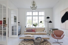 Chic Scandinavian living room with a splash of Parisian charm