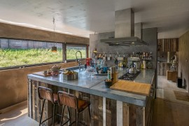 Concrete and wood come together in this Dutch kitchen [Design: Spruyt Arkenbouw]