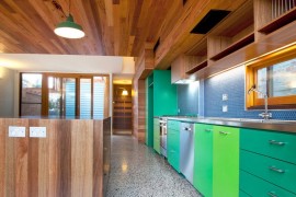 Contemporary kitchen with colorful cabinets