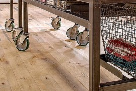 Custom kitchen island on wheels in stainless steel and stone