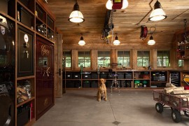 Distinct Holophane lights bring an air of authenticity to the industrial garage [From: Murphy & Co. Design]