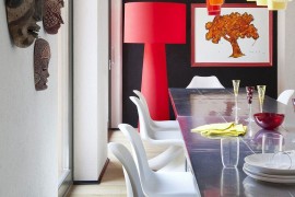 Exquisite use of large floor lamp and pendants in the stunning dining room