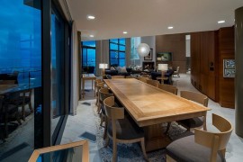 Fabulous dining area with woden table and chairs