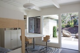 George Nelson lamp and sliding glass doors shape the interior