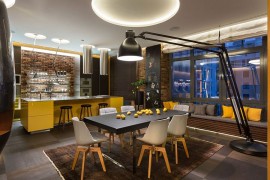Giant floor lamp dwarfs you in the ingenious dining room