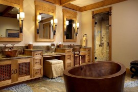 Hand-hammered bathtub steals the show in this warm, inviting bathroom [Design: Zabala Erickson]