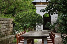 Lush garden patio with an outdoor dining area