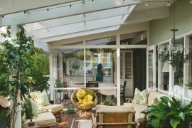 Outdoor lounge area with potted plants