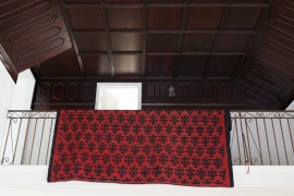Redwood coffered ceiling in a white living room