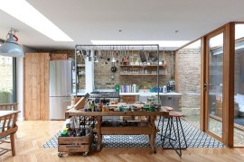 Repurposed decor is perfect for the industrial kitchen [Design: Martins Camisuli Architects]