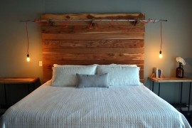 Rustic industrial bedroom with lovely lighting [Design: Erwin Renovation]
