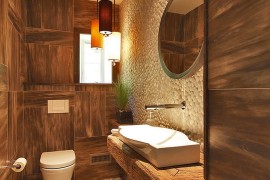 Rustic style works well even in small powder rooms [Design: At Home Design]