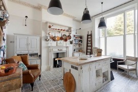 Shabby chic kitchen with smart tile flooring and industrial style lighting [From: Bruce Hemming Photography]
