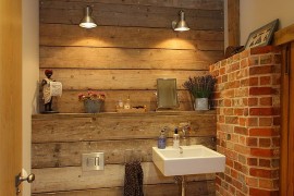 Small bathroom with brick wall and touch of wooden warmth [Design: Hampshire Light]