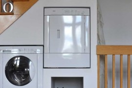 Space Saving Laundry and Pet Bed Area in Montreal