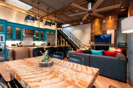 Studio-inspired industrial lighting for the modern home [Design: Beyond Beige Interior Design]