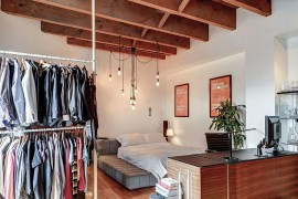 Stylish pendant lighting in this loft bedroom saves up on space [Design: Big Panda Design]