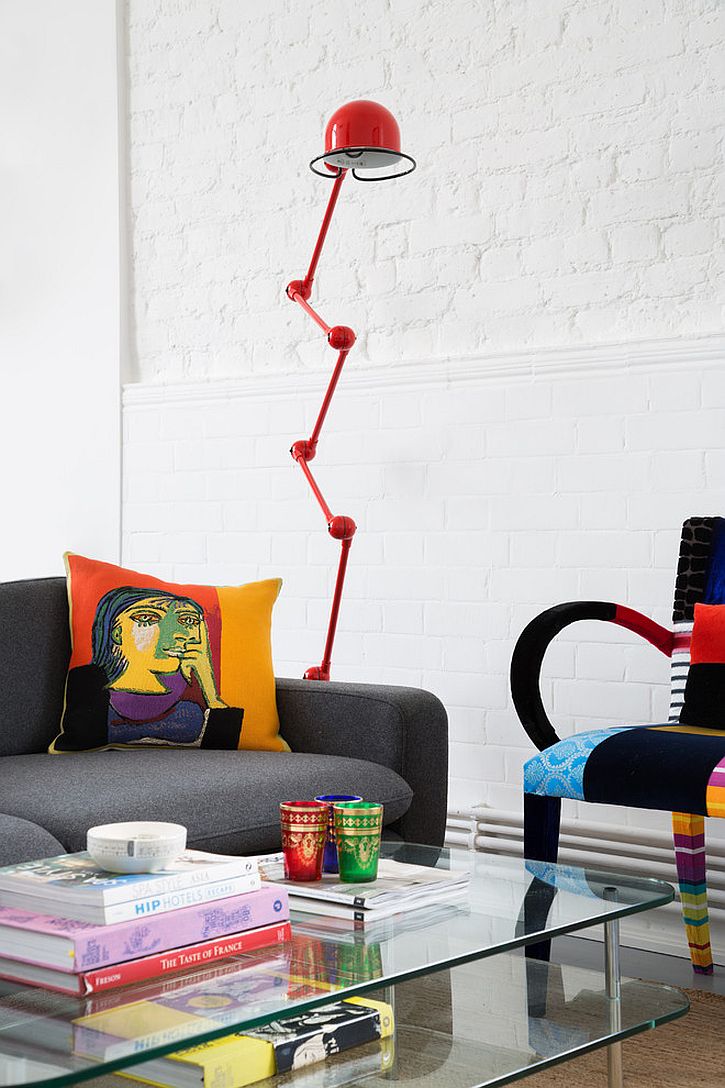 Throw pillows and decor bring color and playfulness to the living room [Design: Trunk Creative]