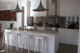 Tom Dixon Replica Pendants from Overseas steal the show in this kitchen [Design: Adriana]