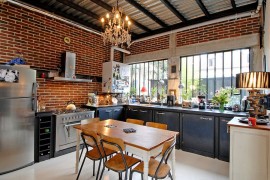 Urbane industrial kitchen with ample natural ventilation [Design: Zoevox]