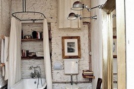 Vintage rustic bathroom design with claw-foot bathtub