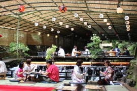 Waterfall in background of Japanese restaurant