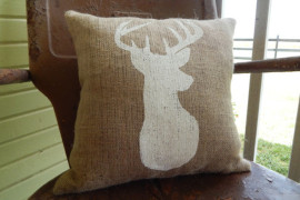 Burlap accent pillow with deer design