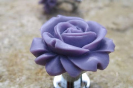 Cute flower-themed door knob in purple