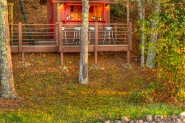 Lakefront home with an outdoor home bar