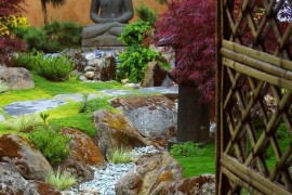 Zen-style garden with Buddha statue