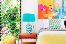 Adding art work to the bedroom walls is all about getting the color scheme right