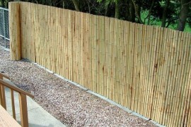 Bamboo fencing adds privacy to chain link