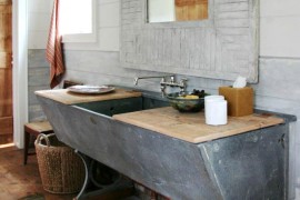 DIY bathroom vanity crafted from old  horse trough