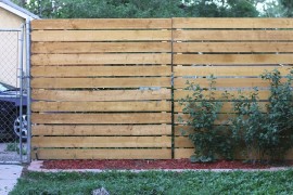 Cedar-panel privacy fence from Smile and Wave