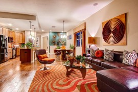 Contemporary living room gets copper sheen with metallic wall art [Design: Boulder Creek Neighborhoods]