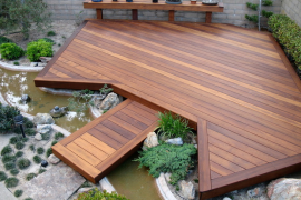 Backyard floating deck over a small stream