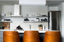 Gorgeous bar stools add wooden warmth to smart kitchen