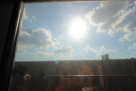 How to Turn Your Window into a Giant Picture Frame Grid