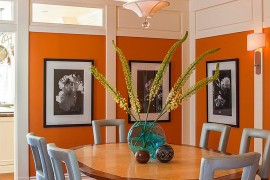 Lovely blend of blue and orange in this vibrant dining room